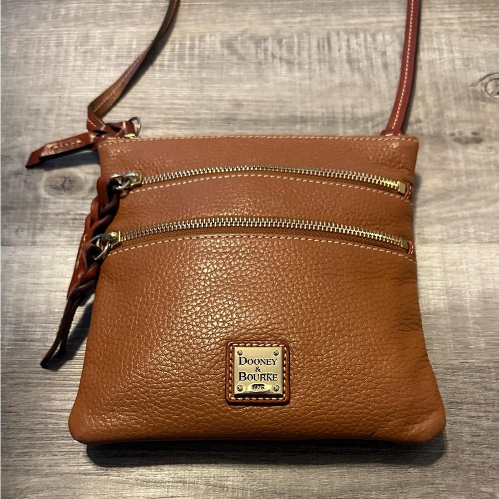 Dooney and Bourke Brown Leather
3 Zipper Crossbody Bag